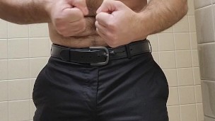 HAIRY MUSCLE BEAR FLEXING IN DRESS PANTS