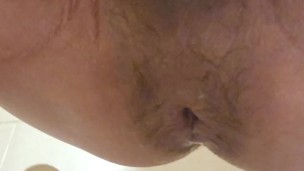 Loose Asian repeatedly pushing horse dildo out of ass, gaping hole
