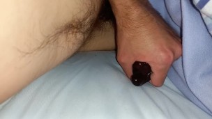 Filling up a coloured condom with breathy orgasm