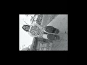 Nurse vicki models in her black and whot hogwarts outfit and spiked boots