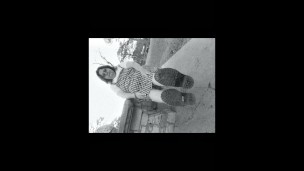 Nurse vicki models in her black and whot hogwarts outfit and spiked boots