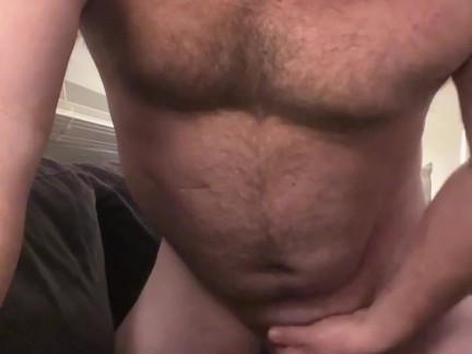 Horny daddy bear on the couch