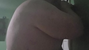 Fat male in chastity sucking off 12 inch dildo