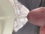 Peeing in a urinal very close up 9/16