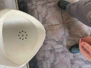 Peeing in a public toilet view from the eyes 1/16