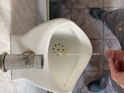 Peeing in a public toilet view from the eyes 7/16