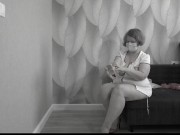 Mature BBW MILF tries on a nurse uniform. 12/16