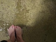 Messy long feet pee outdoors