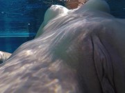 Hot teen with small saggy tits swims nude in a public pool and touches a small dick 4/16