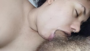 the bitch's mouth bubbles all her spit deep into the hard and excited cock
