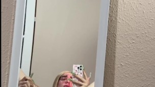 Blonde femboy playing in the mirror