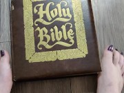 Using my long finger toes to flip through the pages of a Bible with my clean barefeet 1/16