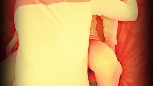 Amateur couple making out in bed