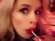 Hot blonde milf sexily sucks a lollipop in front of everyone in a cafe 10/16