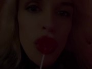 Hot blonde milf sexily sucks a lollipop in front of everyone in a cafe 16/16