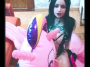 Cosplay girl has fun with a pink inflatable unicorn 10/16