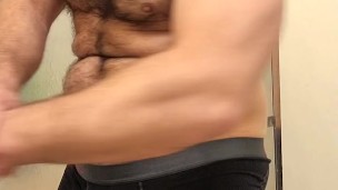 HAIRY MUSCLE BEAR FLEXING