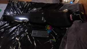 Cocooned in Latex and Teased with Buzzing Toys - rubber sack + toys + hood = HORNY!