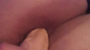 Chubby boy fucks dildo