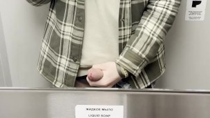 young twink jerking off his cock in train toilet