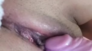 She’s gripping the sheets, moaning harder, taking it all