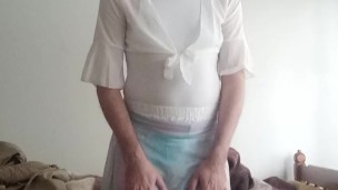 In a bodysuit and miniskirt