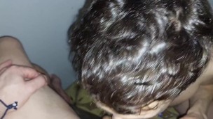Young twink guy's mouth getting stuffed up with well-hung mature dick while public darkroom cruising