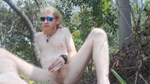 Buck-naked dick stroking adventure outdoors