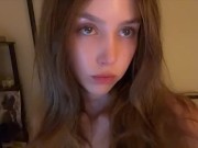 Petite brunette showing off sexy lingerie 5/16