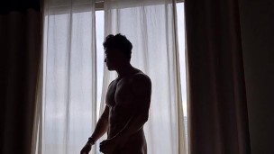 Fitness boy masturbating in window to see him.
