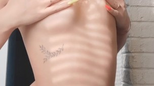 Curvy Temptress Teases Perky Nipples