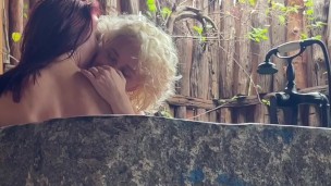 Passion in Paradise: A Steamy Romantic Lesbian Bathtub Makeout