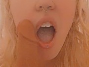 Kitten gives dildo head in the shower hot and steamy