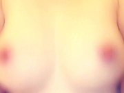 Kitten plays with her titties 1/16