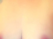 Kitten plays with her titties 2/16