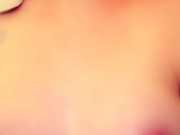 Kitten plays with her titties 4/16