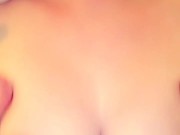 Kitten plays with her titties 6/16