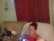 Step mom lifts up her dress and teases with her panties while she plays video games
