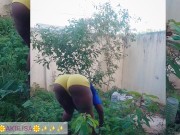 African gardener AKIILISA checking out the fruits of the season/lover's Tshirt and tiny booty short/ 6/16