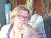 Smoker shows off boobs