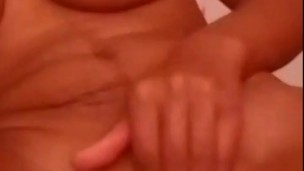 Ebony babe Kiraah rubbing her juicy Ebony pussy for me