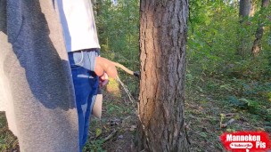 On a walk in the forest, long pissing under a tree