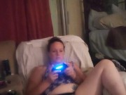 Beautiful bbw long hair brunette lifts up her mini dress and smokes cigarettes while playing games