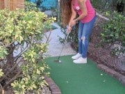 Small petite girl playing golf and not doing good at it 3/16