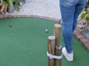 Small petite girl playing golf and not doing good at it 9/16