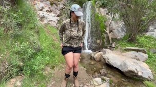 Pissing in a waterfall