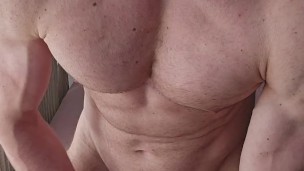 Tall muscular hunk stroking his BWC
