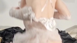 Twink in wedding dress fucks both his holes