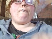 Smoker plays with boobs