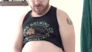 Chubby Nathan Jerks Off While He Stuffs Himself with a Twinkie